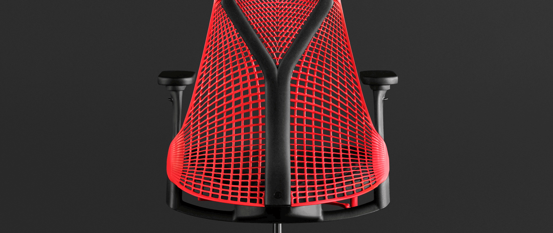 Animation calquée sur une photo d'un siège Sayl rouge pour mettre en avant les avantages de son dossier à suspension 3D Intelligent.